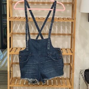 Free people we the free short cutoff denim overalls. Size 28